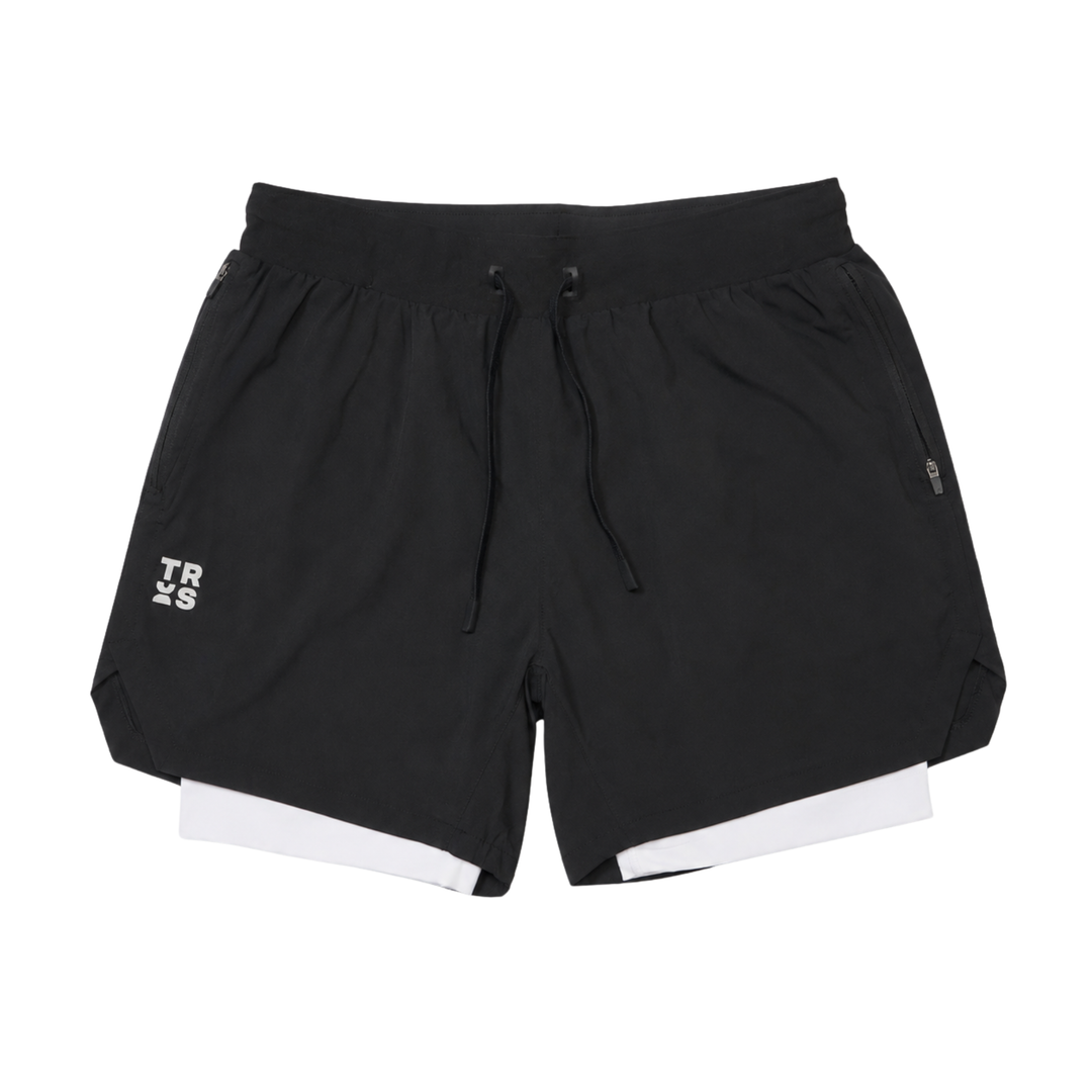 TROS Resilience PDP 2026-05 · Short Resilience - Negro Calza Blanca · 01 · 01 hero flat lay product