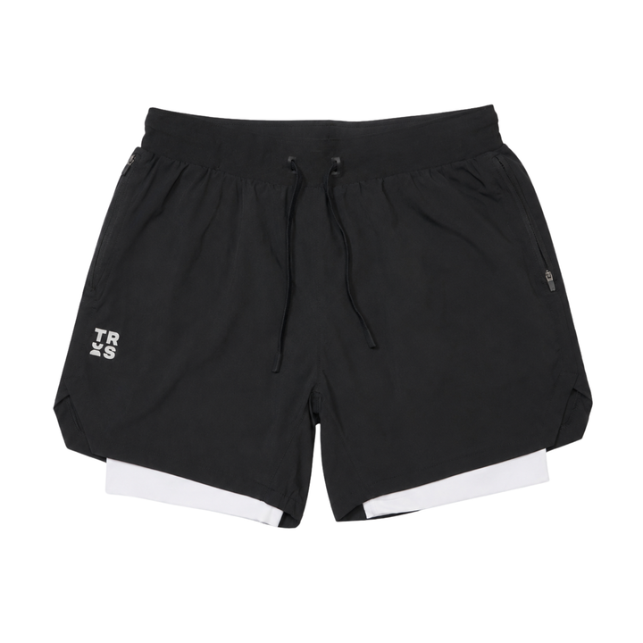 TROS Resilience PDP 2026-05 · Short Resilience - Negro Calza Blanca · 01 · 01 hero flat lay product