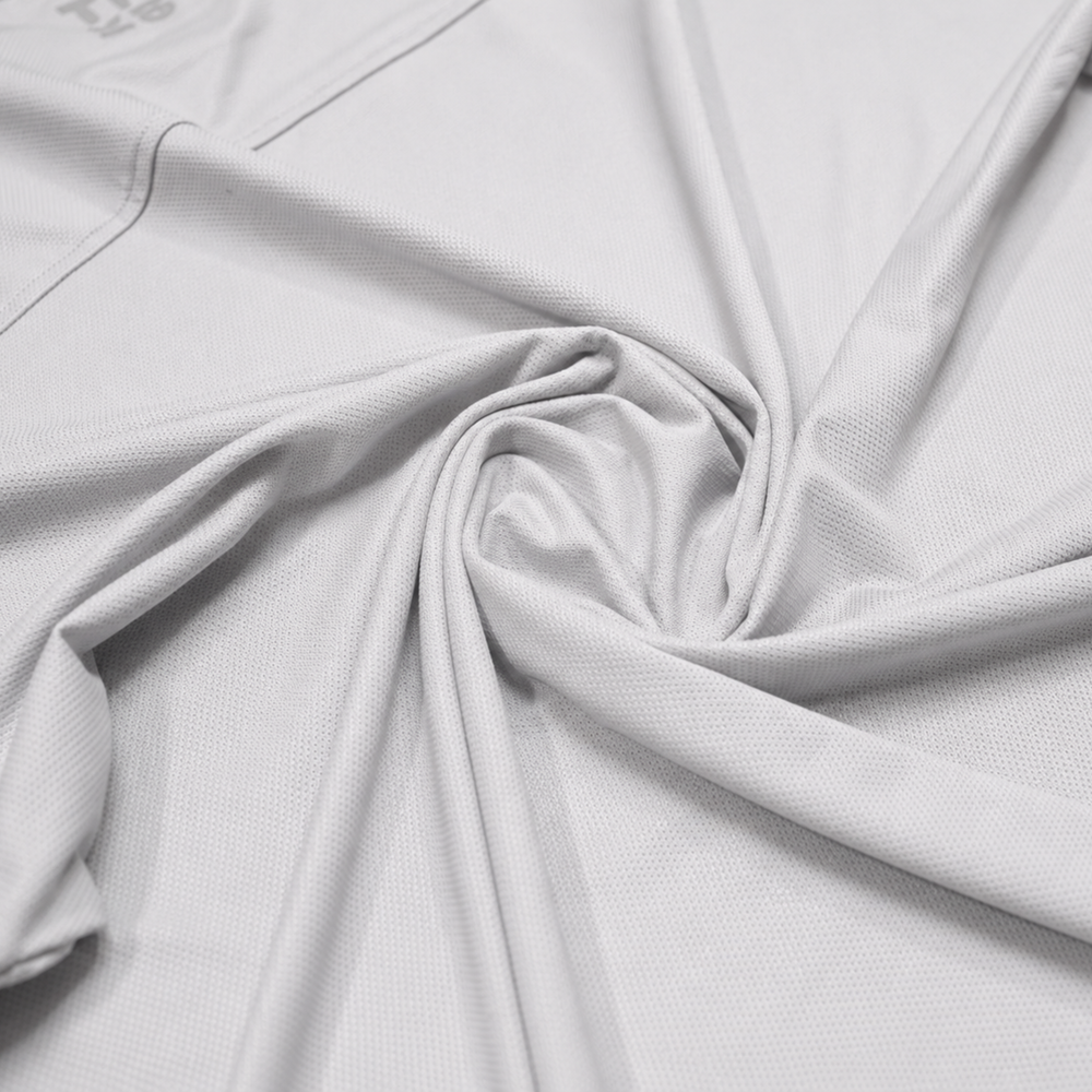TROS Resilience PDP 2026-05 · Polera Resilience - Gris · 07 · 07 fabric detail