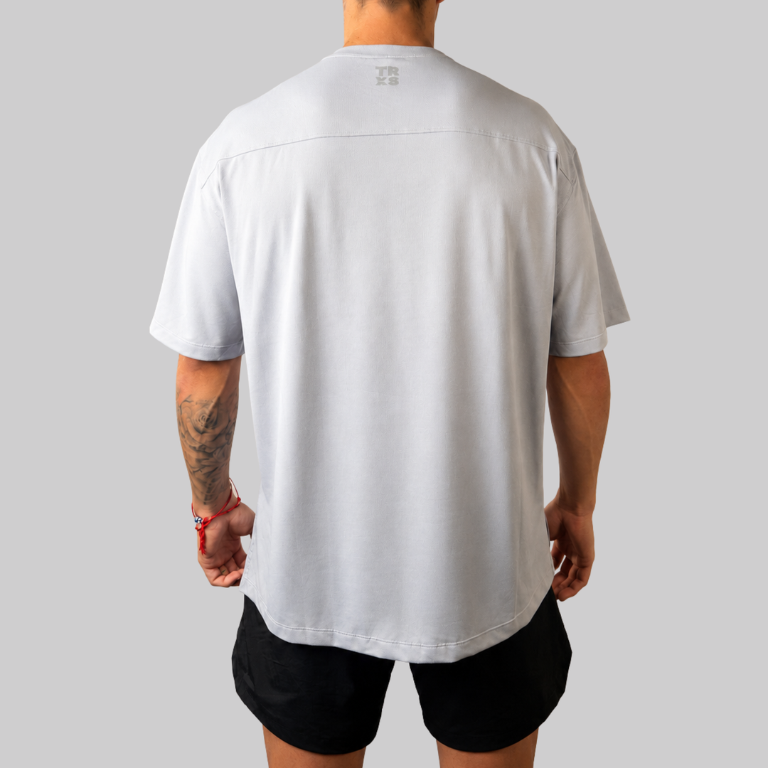 TROS Resilience PDP 2026-05 · Polera Resilience - Gris · 03 · 03 model back