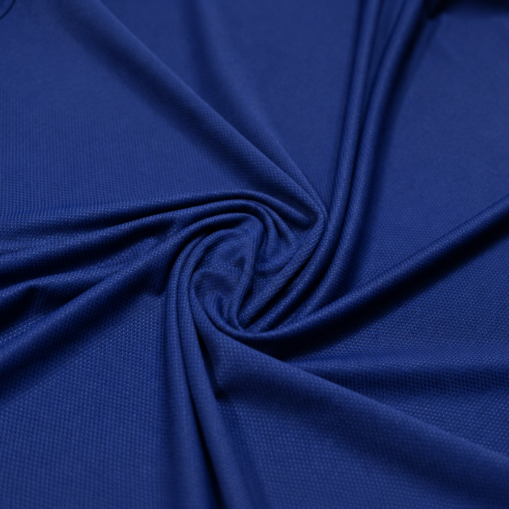 TROS Resilience PDP 2026-05 · Polera Resilience - Azul · 06 · 06 fabric detail
