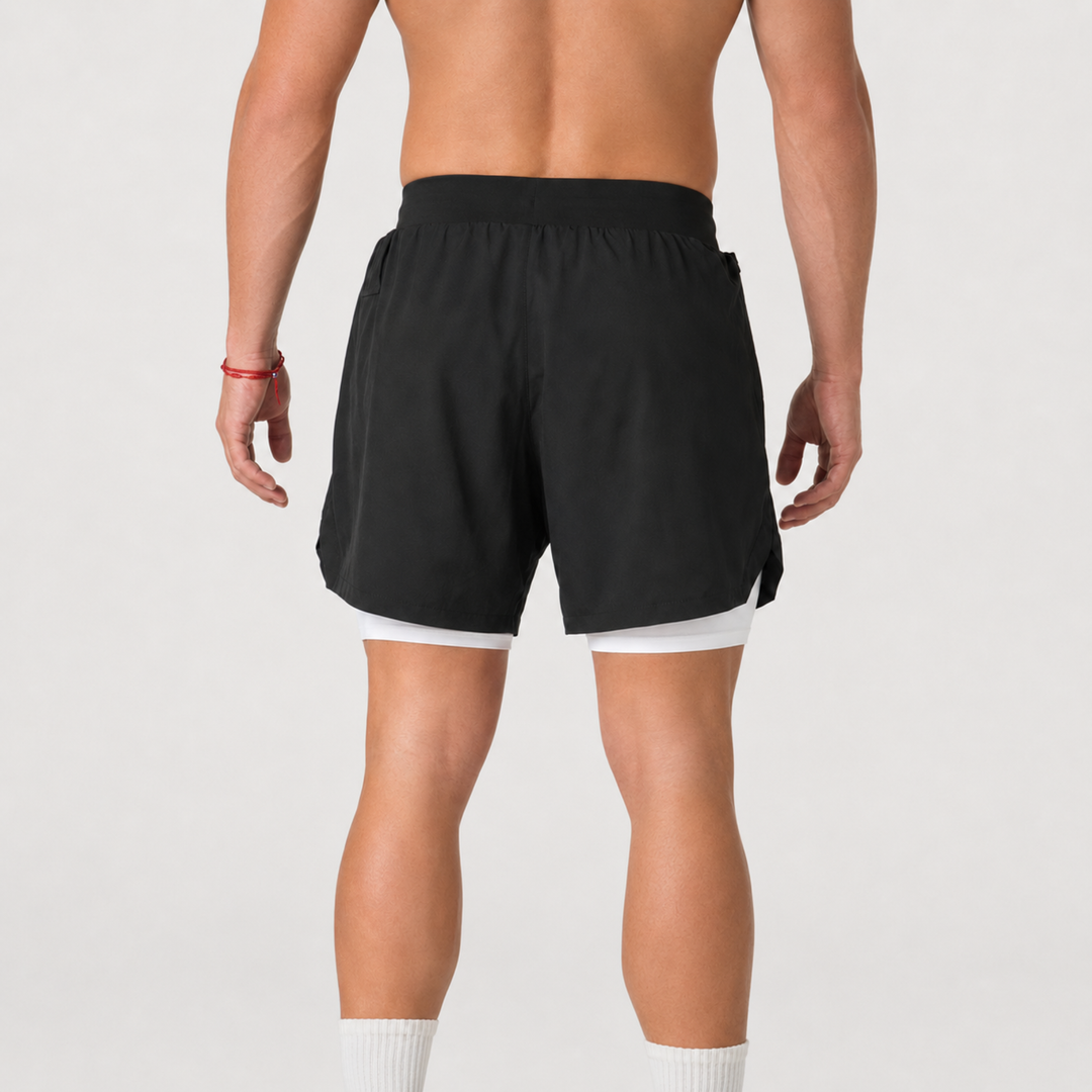 TROS Resilience PDP 2026-05 · Short Resilience - Negro Calza Blanca · 04 · 04 model back clean rear