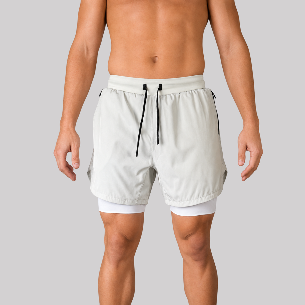 TROS Resilience PDP 2026-05 · Short Resilience - Stone Calza Blanca · 02 · 02 hover model front