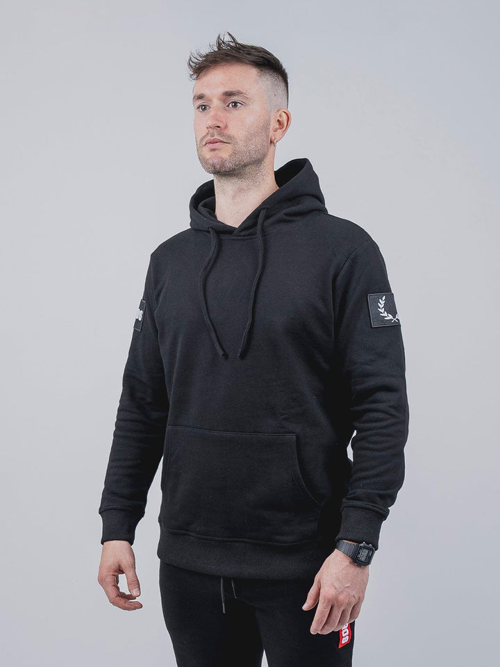 Rise Poleron Negro, Colección Rise, 100% Algodón, Poleron deportivo, Estilo de vida activo, Versatilidad, Negro, Bolsillo tipo canguro, Tela elástica, Amplitud, Calidez, Prenda de uso diario, Prenda para entrenar.