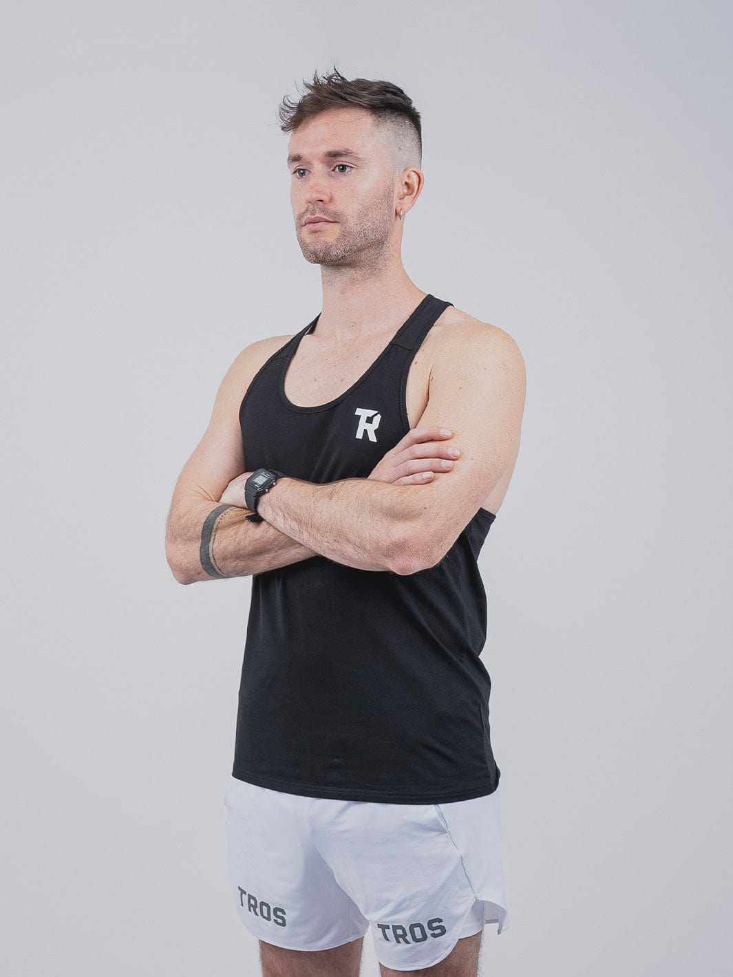 Tank Top, Colección Iron Born, Polera Azul y Negra, Ajuste ajustado, Espalda abierta, 95% Algodón, 5% Spandex, Ropa deportiva, Estilo de vida activo, Calidad, Diseño moderno.